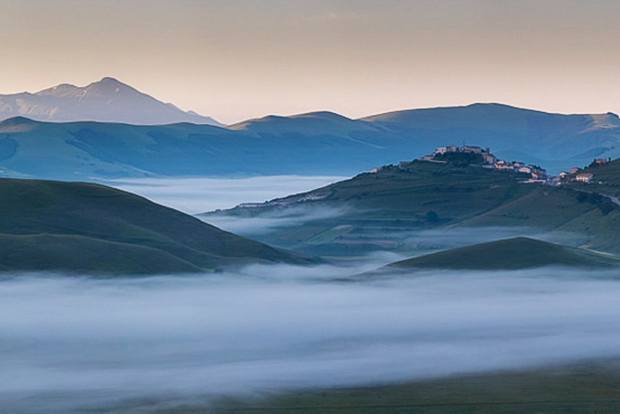 Morning mist and the village of Castelluccio
