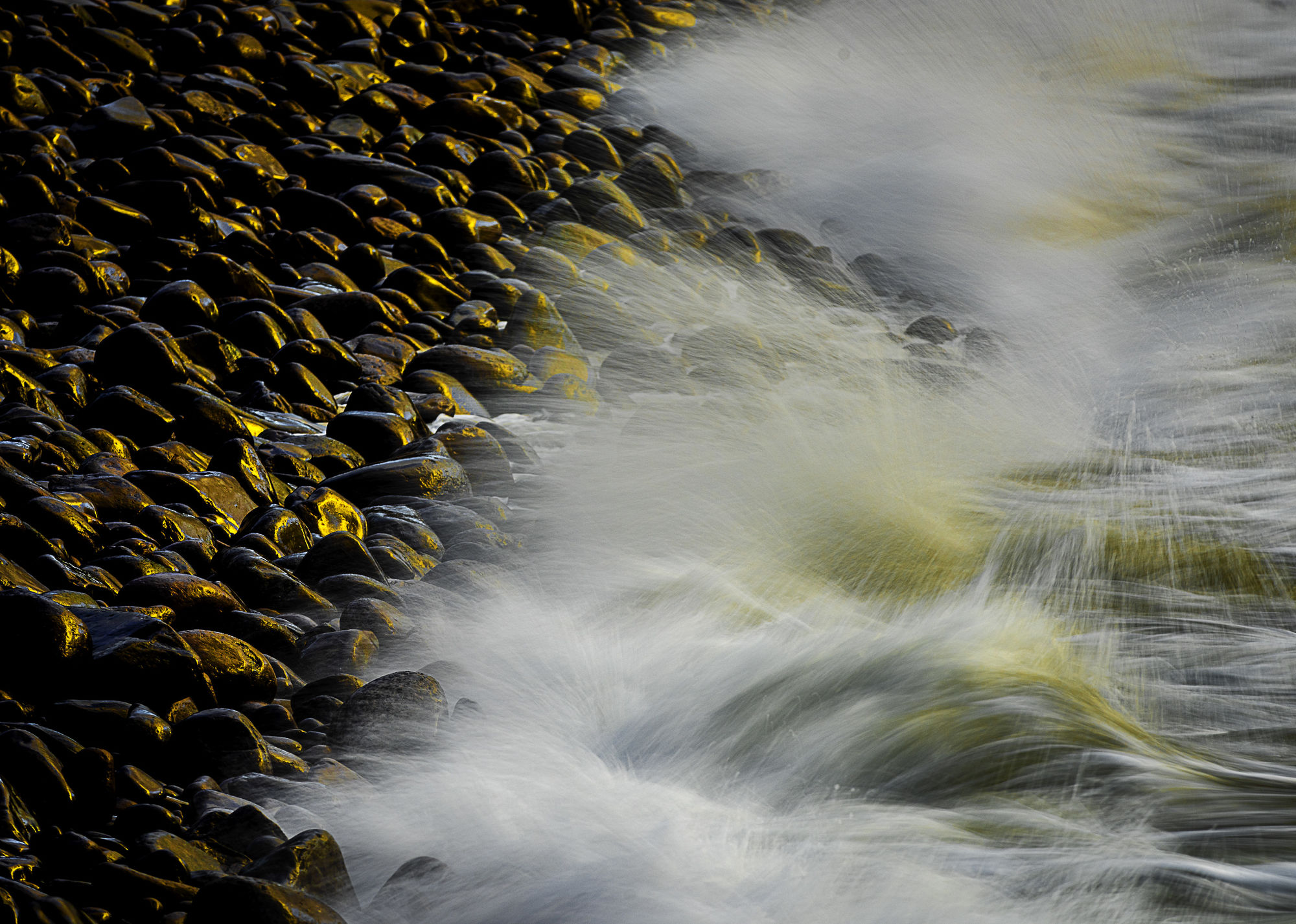 Flow: Ireland storm beach rocks