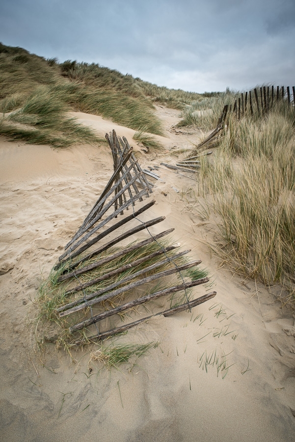 Broken fence Camber Sands, East Sussex