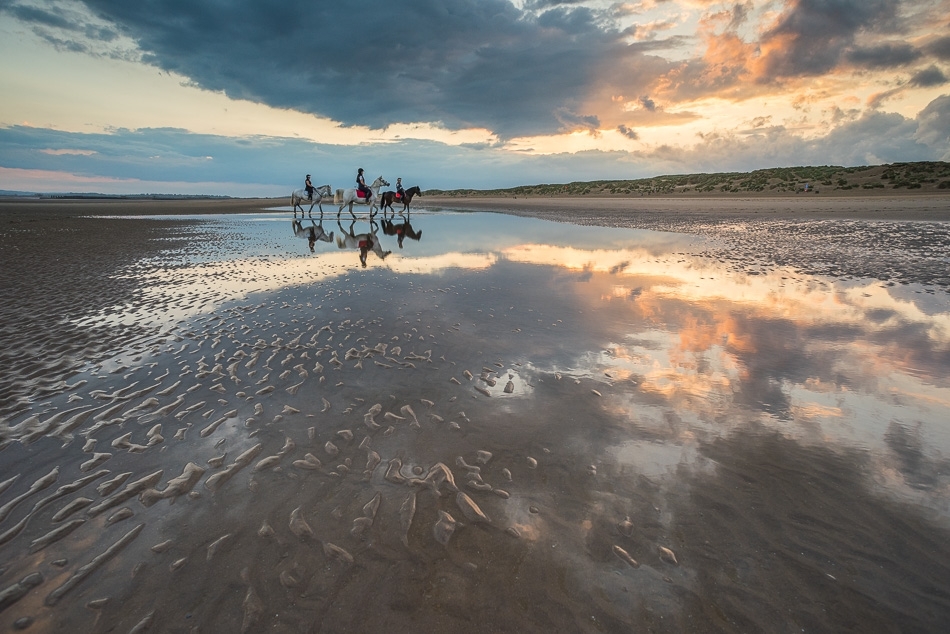 Horse riders Camber Sands, East Sussex