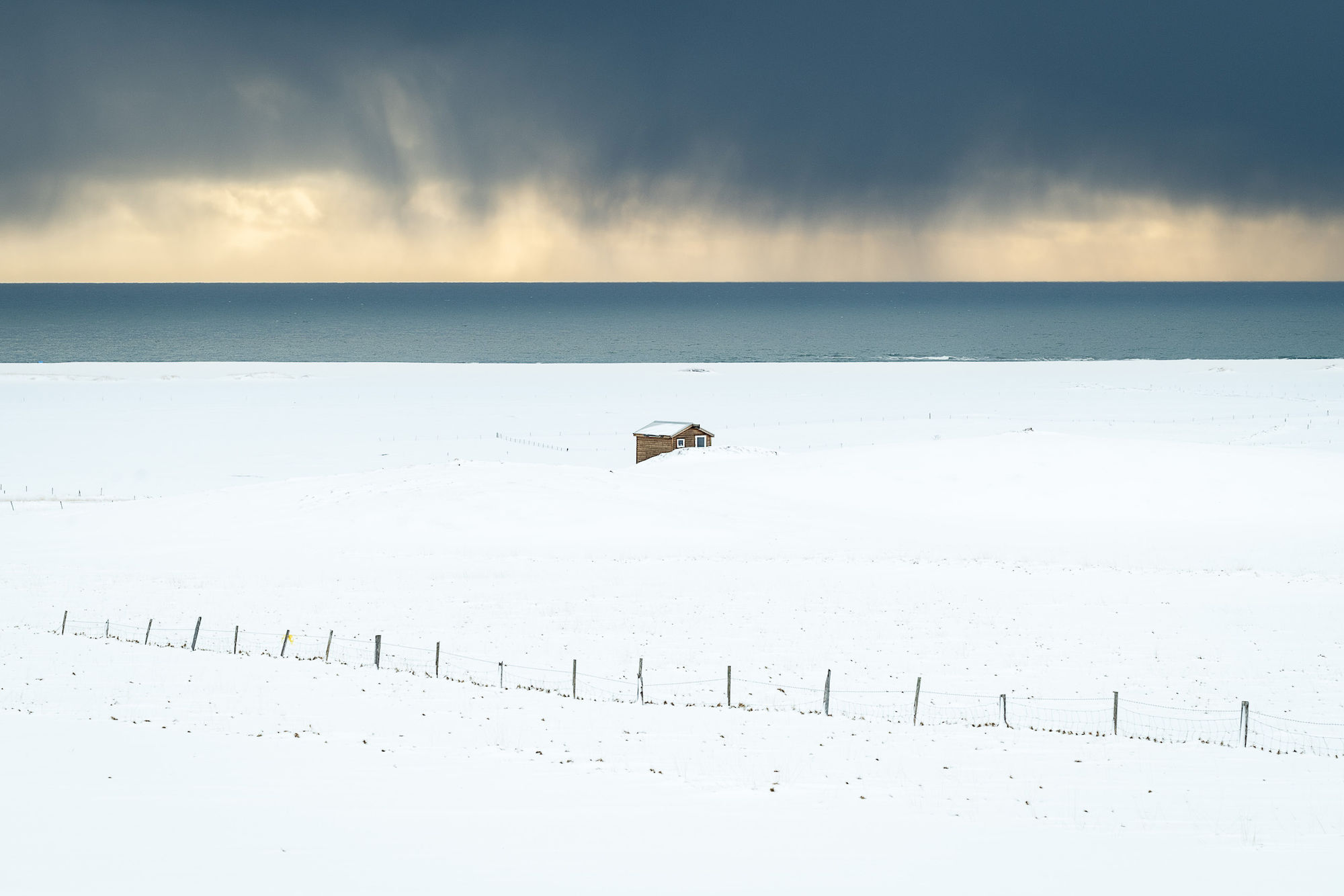 Hut and approaching storm