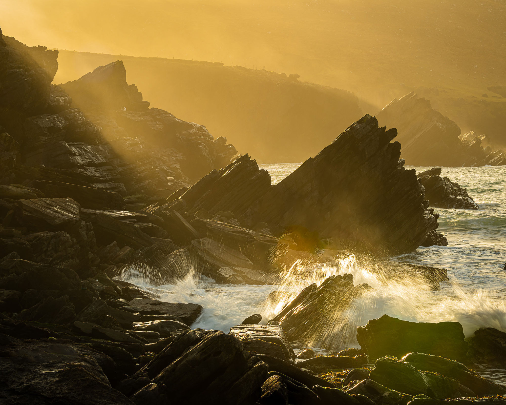 waves sunset crashing